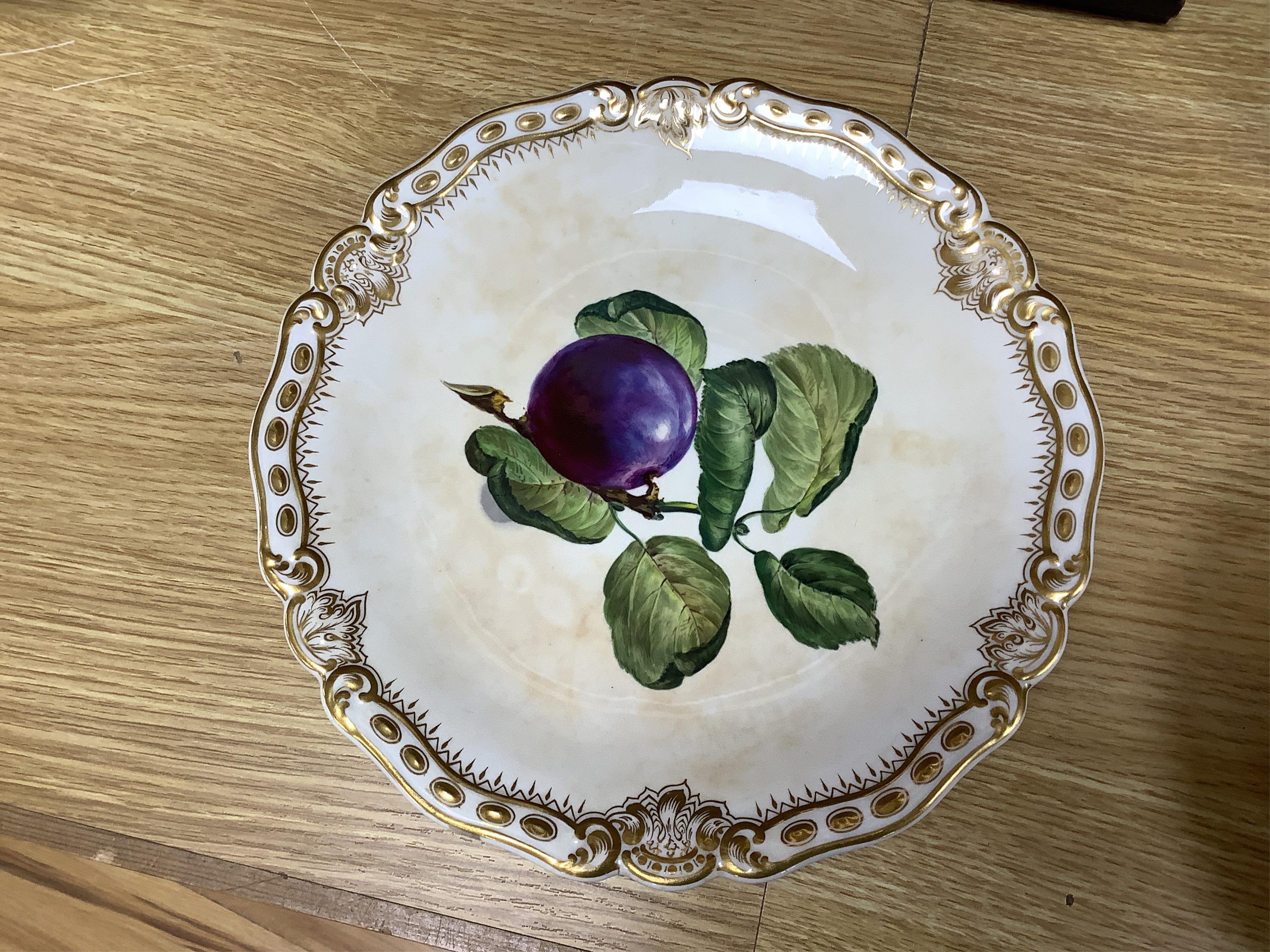 A late 19th century Worcester dessert service hand painted with fruit, largest 30cm wide. Condition - mostly good